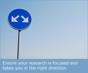 Direction sign with subtitle - Ensure your research is focussed and takes you in the right direction